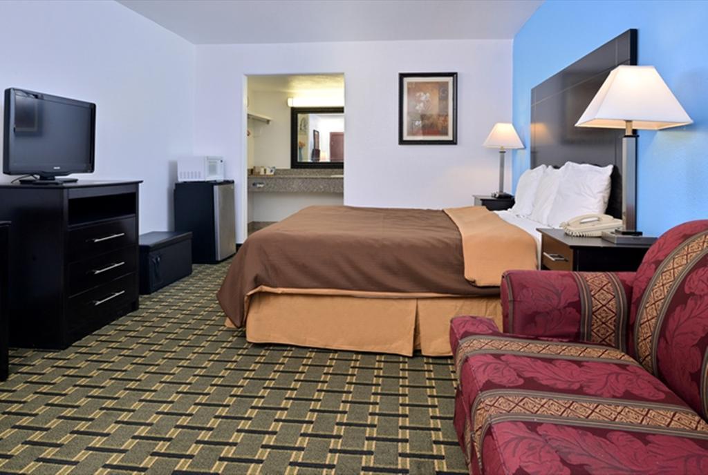 Executive Inn Edmond Habitación foto